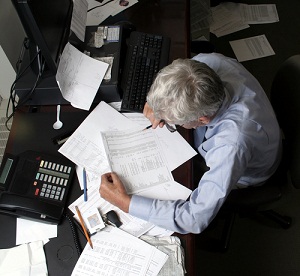 Older worker at desk